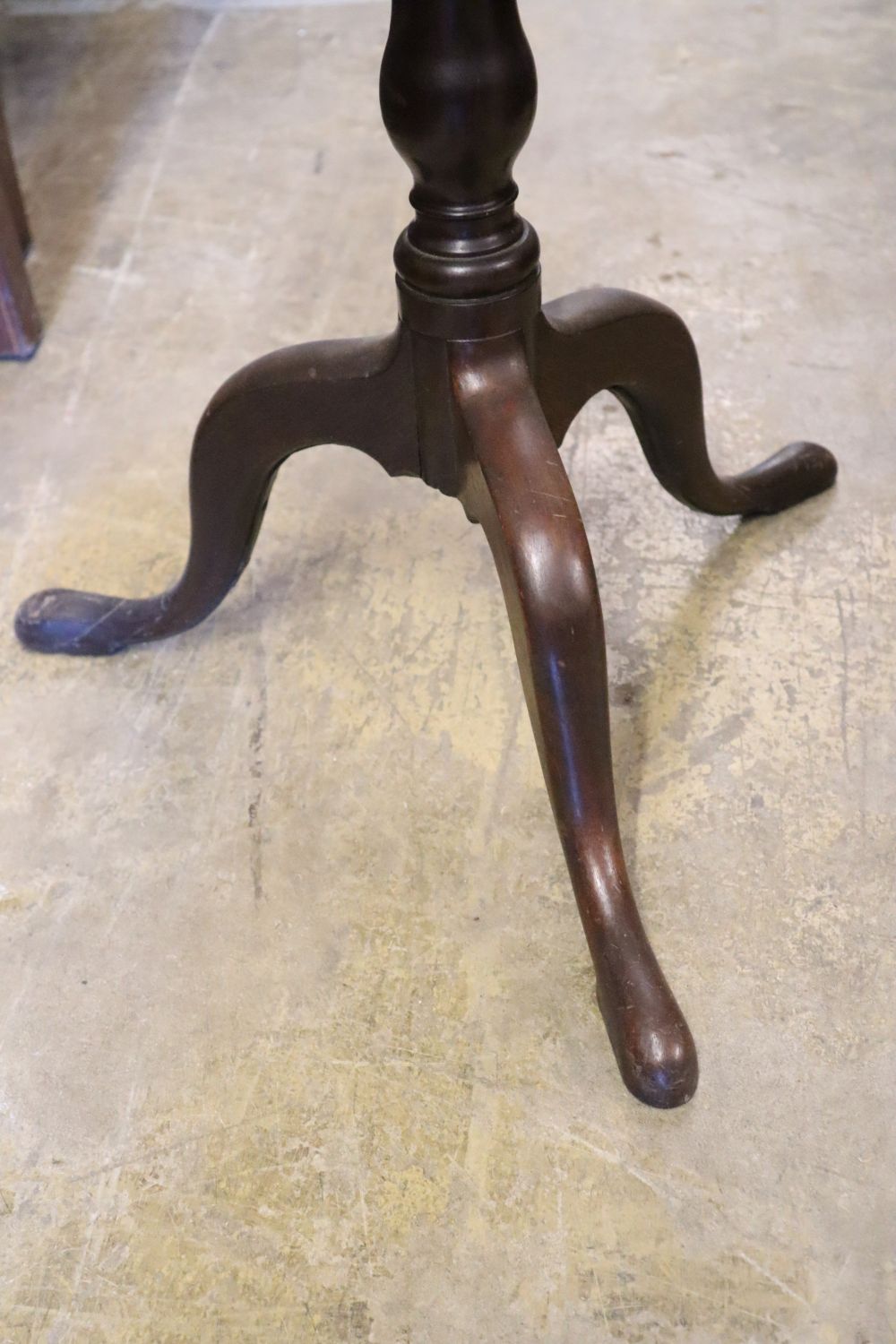 An early 19th century mahogany tripod table, with dished top, width 50cm